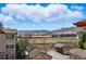 Scenic exterior view with expansive landscape and mountain backdrop under a clear sky at 9557 W San Juan Cir # 306, Littleton, CO 80128