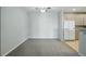 Expansive living space connects to the kitchen, ideal for modern living and entertaining at 9557 W San Juan Cir # 306, Littleton, CO 80128