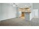 Spacious living area seamlessly flows into kitchen, creating an inviting and open concept design at 9557 W San Juan Cir # 306, Littleton, CO 80128