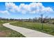 Walking path through a well maintained lawn at 9557 W San Juan Cir # 306, Littleton, CO 80128