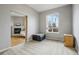 A spacious bedroom with large windows that provide lots of natural light at 1057 W Century Dr # 112, Louisville, CO 80027
