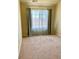 Cozy bedroom featuring neutral carpeting, sheer curtains, and ample natural light at 1368 Royal Troon Dr, Castle Rock, CO 80104