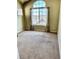 Comfortable bedroom featuring neutral carpeting, large windows, and ample natural light at 1368 Royal Troon Dr, Castle Rock, CO 80104