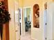 Hallway decorated with decorations leading to other rooms in the home at 1368 Royal Troon Dr, Castle Rock, CO 80104