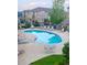 Inviting community pool with lounge chairs and a patio area, perfect for relaxing on summer days at 1368 Royal Troon Dr, Castle Rock, CO 80104