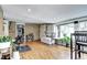 Bright bonus room with vinyl wood floors, a large window, and a cozy atmosphere at 715 Zang St, Lakewood, CO 80401