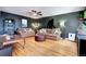 Inviting living room with hardwood floors, comfortable sofas, and stylish decor at 715 Zang St, Lakewood, CO 80401