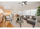 Spacious living room featuring a sectional sofa and a cozy fireplace at 2139 Clay St, Denver, CO 80211