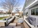 Outdoor patio featuring comfortable seating, a modern fire pit, and a hot tub for year-round enjoyment at 4010 E 129Th Way, Thornton, CO 80241