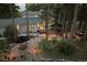 Aerial view showcasing the home, landscaping, and outdoor living spaces at 18971 Shadowood Dr, Monument, CO 80132