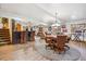 Finished basement with a wet bar, game table, and entertainment area at 18971 Shadowood Dr, Monument, CO 80132