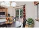 Bright dining area with sliding glass doors leading to outdoor deck at 18971 Shadowood Dr, Monument, CO 80132