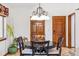 Cozy dining area featuring a round table and hardwood floors at 18971 Shadowood Dr, Monument, CO 80132