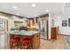Gourmet kitchen with a large island, stainless steel appliances, and custom cabinetry at 18971 Shadowood Dr, Monument, CO 80132
