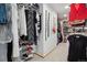 Spacious walk-in closet with clothing racks, shelves, and ample storage at 18971 Shadowood Dr, Monument, CO 80132