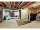 Unfinished basement area with exposed beams and utility access at 6833 Longpark Dr, Parker, CO 80138