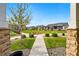 View of the street and houses from the front porch of the house at 6833 Longpark Dr, Parker, CO 80138