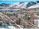Aerial view of the apartment building with mountain backdrop at 451 Golden Cir # 210, Golden, CO 80401