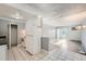 View of the living room and kitchen with lots of natural light from sliding glass doors at 451 Golden Cir # 210, Golden, CO 80401