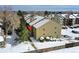 Aerial view highlighting the subject property in a snowy landscape at 10872 W Evans Ave # 2E, Lakewood, CO 80227