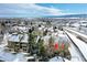 Aerial view showing the property and its surroundings in winter at 10872 W Evans Ave # 2E, Lakewood, CO 80227