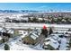 Aerial view showcasing the property's location and winter setting at 10872 W Evans Ave # 2E, Lakewood, CO 80227