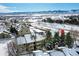 Wide aerial view of the property, highlighting its location and features at 10872 W Evans Ave # 2E, Lakewood, CO 80227