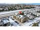 Wide aerial view showing the property and surrounding neighborhood at 10872 W Evans Ave # 2E, Lakewood, CO 80227