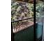 Balcony with trees as the focal point offering a serene outdoor retreat at 10872 W Evans Ave # 2E, Lakewood, CO 80227