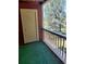 Balcony featuring an exterior closet and scenic tree views at 10872 W Evans Ave # 2E, Lakewood, CO 80227