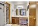 Bathroom with vanity, sink, and shower at 10872 W Evans Ave # 2E, Lakewood, CO 80227