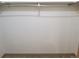 Walk-in closet with a rod for hanging clothes providing ample storage space at 10872 W Evans Ave # 2E, Lakewood, CO 80227