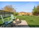 Outdoor fire pit area with cozy seating, ideal for enjoying evenings in the landscaped backyard at 2801 N Garfield St, Denver, CO 80205