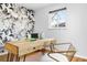 Stylish office with wooden desk, accent wall, and hardwood floors at 2801 N Garfield St, Denver, CO 80205