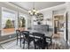 Bright dining room features a large window and a neutral color palette at 13850 Meadowbrook Dr, Broomfield, CO 80020