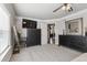 Main bedroom with carpet, decorative dressers, and ceiling fan at 13850 Meadowbrook Dr, Broomfield, CO 80020