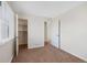 Bedroom featuring neutral walls, carpet, and closet space at 1100 Hillside St, Aurora, CO 80010