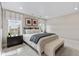 Bright and open bedroom with neutral colors and windows with natural light at 9354 Quartz St, Arvada, CO 80007