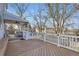 Spacious wooden deck with ample seating and a covered area for outdoor enjoyment at 19827 E Prentice Ave, Centennial, CO 80015