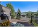 Relaxing deck featuring outdoor seating, a grill, and stunning views at 31028 Big Bear Dr, Evergreen, CO 80439