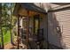 Inviting front entrance with stairs leading to the covered porch at 31028 Big Bear Dr, Evergreen, CO 80439