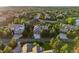 Captivating aerial view showcases the home's position in a tree-lined neighborhood with beautiful surrounding properties at 6279 Oxford Peak Pl, Castle Rock, CO 80108