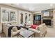 Finished basement with stone fireplace, built-in bar, and cozy seating area, perfect for recreation and relaxation at 6279 Oxford Peak Pl, Castle Rock, CO 80108