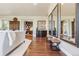 Living room with hardwood floors and open floor plan at 6279 Oxford Peak Pl, Castle Rock, CO 80108