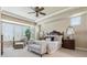 Bright and airy main bedroom with bay windows and trey ceilings at 6279 Oxford Peak Pl, Castle Rock, CO 80108
