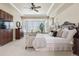 Bright and airy main bedroom with bay windows and trey ceilings at 6279 Oxford Peak Pl, Castle Rock, CO 80108