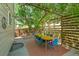 Charming backyard patio with a pergola, string lights, and outdoor dining set at 215 Mcafee Cir, Erie, CO 80516