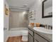 Clean bathroom with a glass-enclosed shower, and modern vanity at 215 Mcafee Cir, Erie, CO 80516