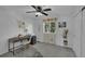 Bedroom featuring a desk, chair, window and modern decor at 215 Mcafee Cir, Erie, CO 80516
