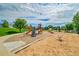 A fun playground with slide, monkey bars, and other playground equipment at 215 Mcafee Cir, Erie, CO 80516
